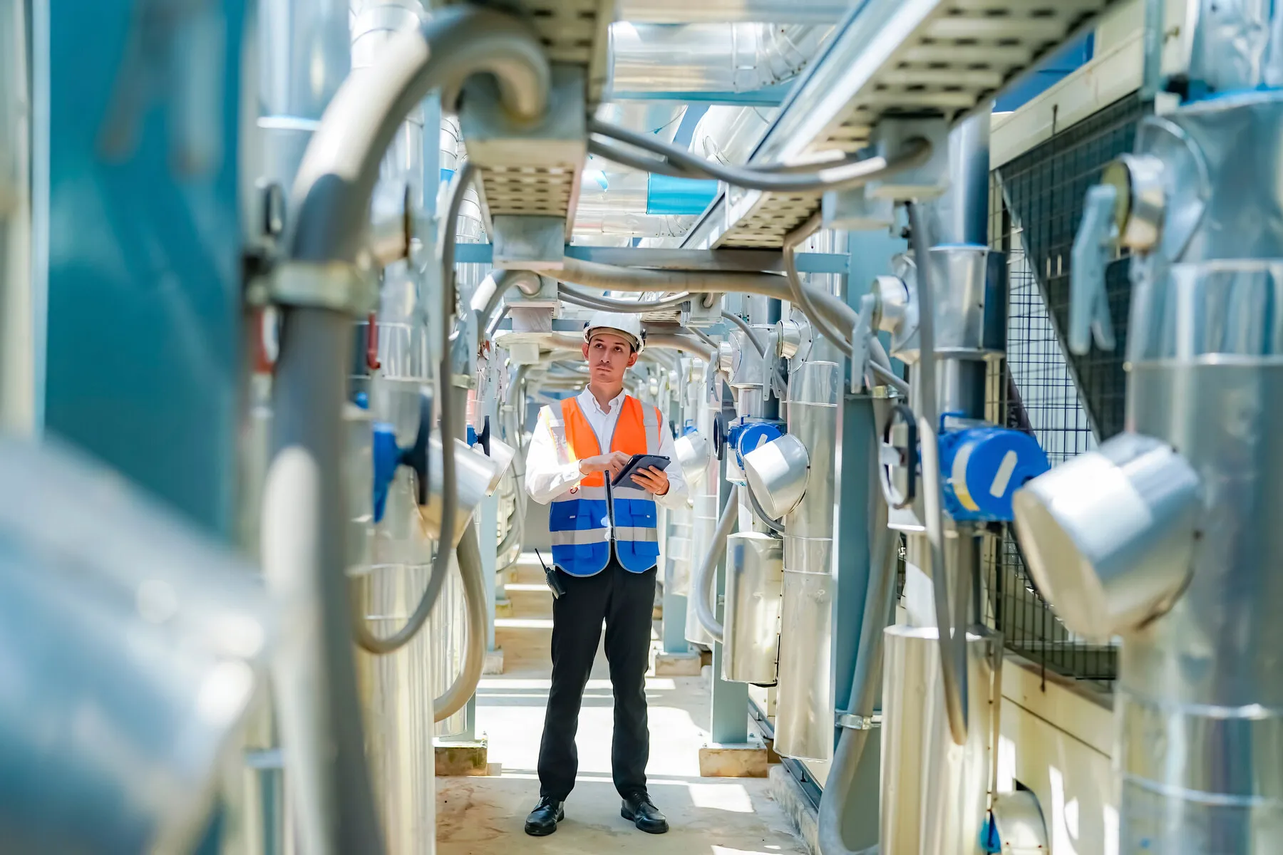 Facility engineer reviewing water system monitoring data