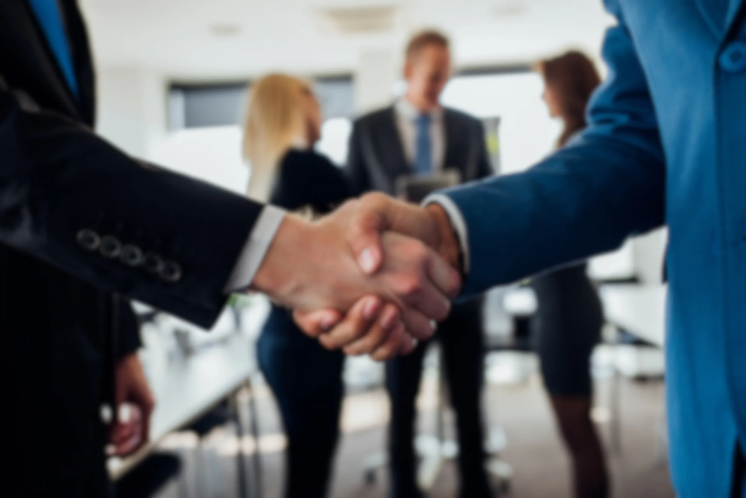 Business partners shaking hands